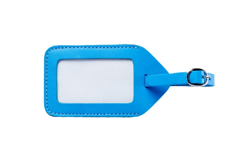 An image of a bright blue luggage tag