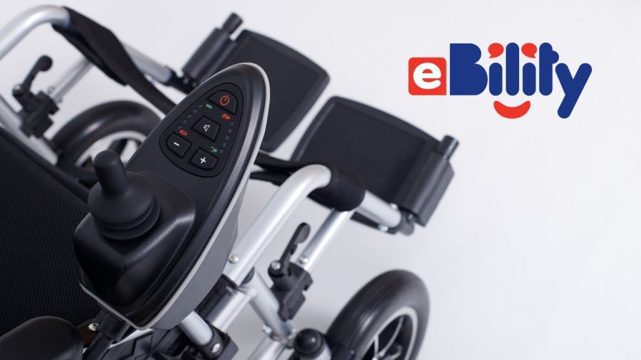 detail of an electric wheelchair with an armrest control